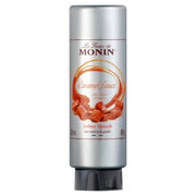 Monin Caramel Sauce – 500 ml creamy caramel drizzle, ideal for topping desserts, coffees, milkshakes, and pastries; perfect wholesale supply for cafés, bakeries, juice bars, and restaurants